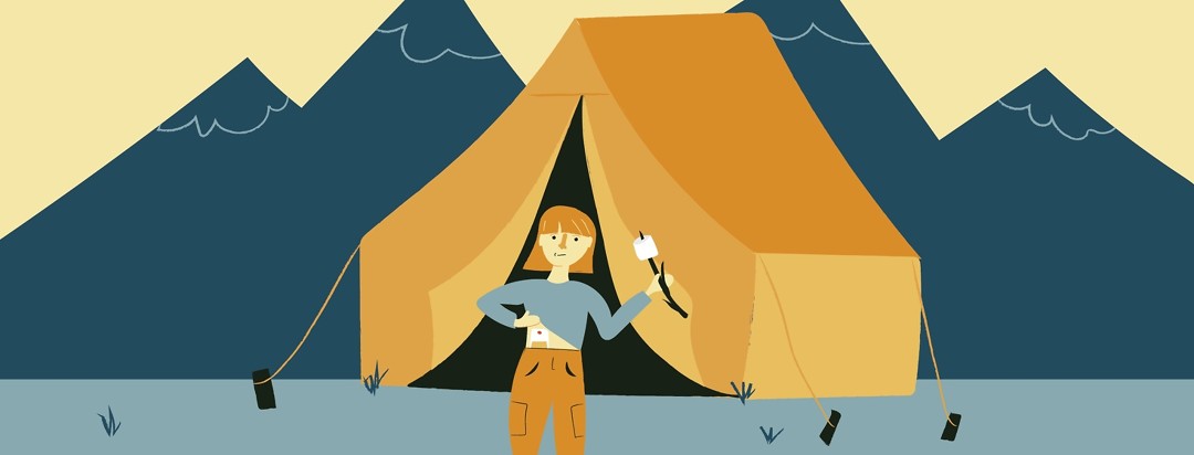 Woman camping, standing outside of her tent showing her stoma and holding a marshmallow on a stick