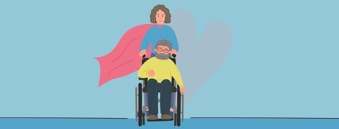 a woman with a cape on pushing a man in a wheelchair