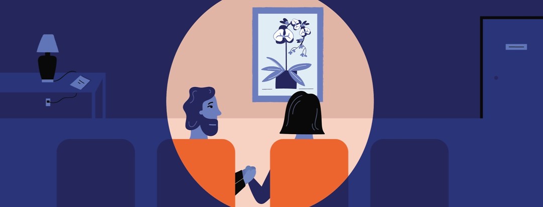 a woman sitting in a chair in a doctor's office waiting room looking at a painting of an orchid on the wall while a man holds her hand