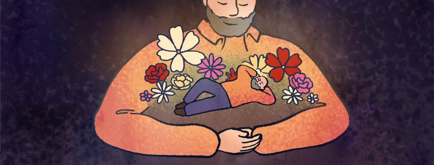 A man's arms create a circle in which his smaller self relaxes among flowers.