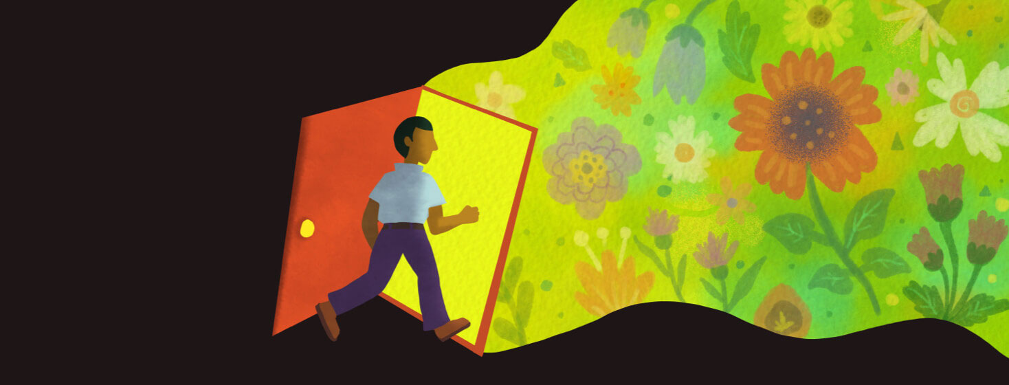 Adult male surrounded by darkness walks through a open door that leads to a path of light and flowers. POC